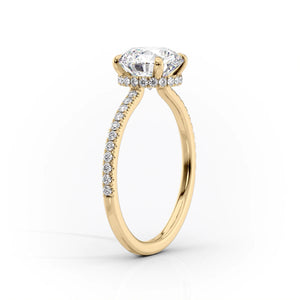 The Pave Aline Set With A 1 Carat Emerald Moissanite