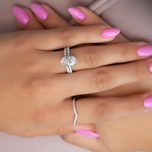 The Pave Aline Set With A 1 Carat Oval Lab Diamond