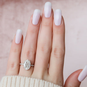 The Pave Aline Set With A 1 Carat Oval Lab Diamond