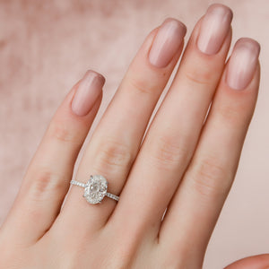 The Pave Aline Set With A Oval Lab Diamond