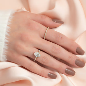 The Pave Aline Set With A Oval Lab Diamond
