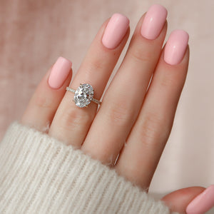 The Pave Aline Set With A Oval Lab Diamond