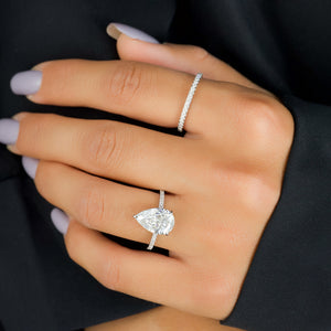 The Pave Aline Set With A 1 Carat Pear Lab Diamond