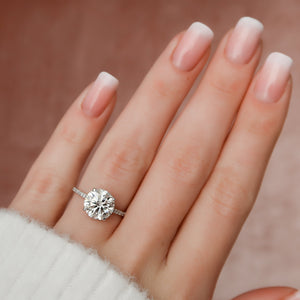 The Pave Aline Set With A Round Lab Diamond