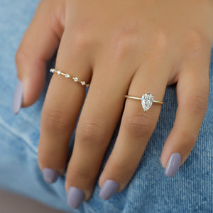 The Kamellie Set With A 5 Carat Pear Moissanite