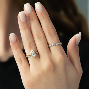 The Kamellie Set With A 5 Carat Pear Moissanite
