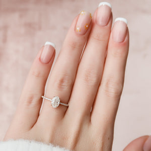 The Pave Kamellie Set With A 1 Carat Oval Moissanite
