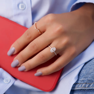 The Pave Kamellie Set With A 1 Carat Oval Moissanite