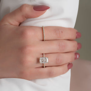 The Pave Kamellie Set With A 1 Carat Radiant Moissanite