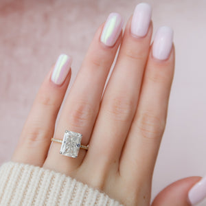 The Pave Kamellie Set With A 1 Carat Radiant Moissanite