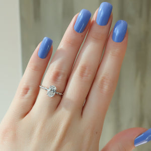 The Alice Set With A 4 Carat Oval Moissanite