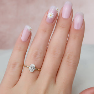 The Nelly Set With A 2 Carat Oval Moissanite