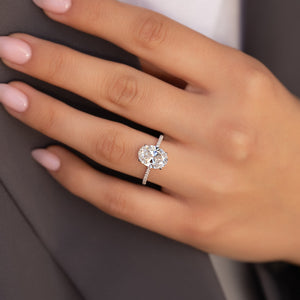 The Pave Nelly Set With A Oval Lab Diamond