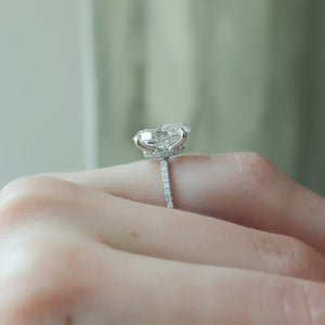 The Pave Nelly Set With A Oval Lab Diamond