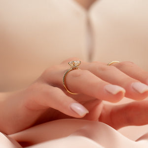 The Pave Nelly Set With A Oval Lab Diamond