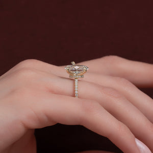 The Pave Nelly Set With A Oval Lab Diamond