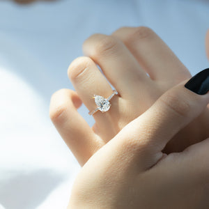 The Pave Nelly Set With A 2.5 Carat Pear Lab Diamond