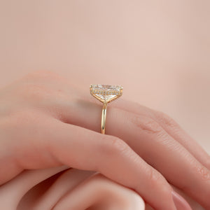 The Crown Kamellie Set With A 2 Carat Elongated Cushion Moissanite