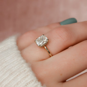The Crown Kamellie Set With A 2 Carat Elongated Cushion Moissanite