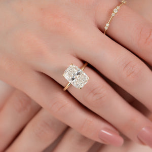 The Crown Kamellie Set With A 2 Carat Elongated Cushion Moissanite