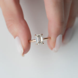 The Crown Kamellie Set With A 3 Carat Emerald Moissanite