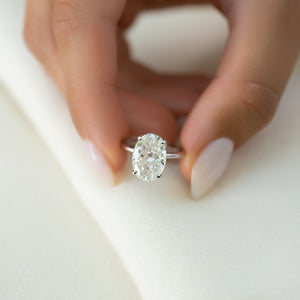 The Crown Kamellie Set With A 5 Carat Oval Moissanite