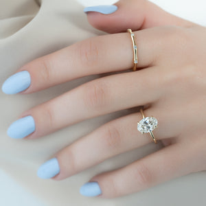 The Crown Kamellie Set With A 1.5 Carat Oval Lab Diamond
