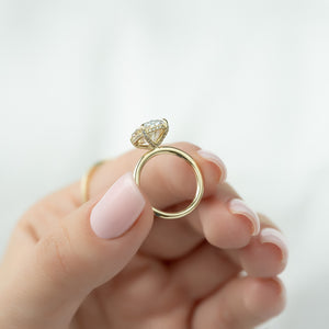 The Crown Kamellie Set With A 1.5 Carat Oval Lab Diamond