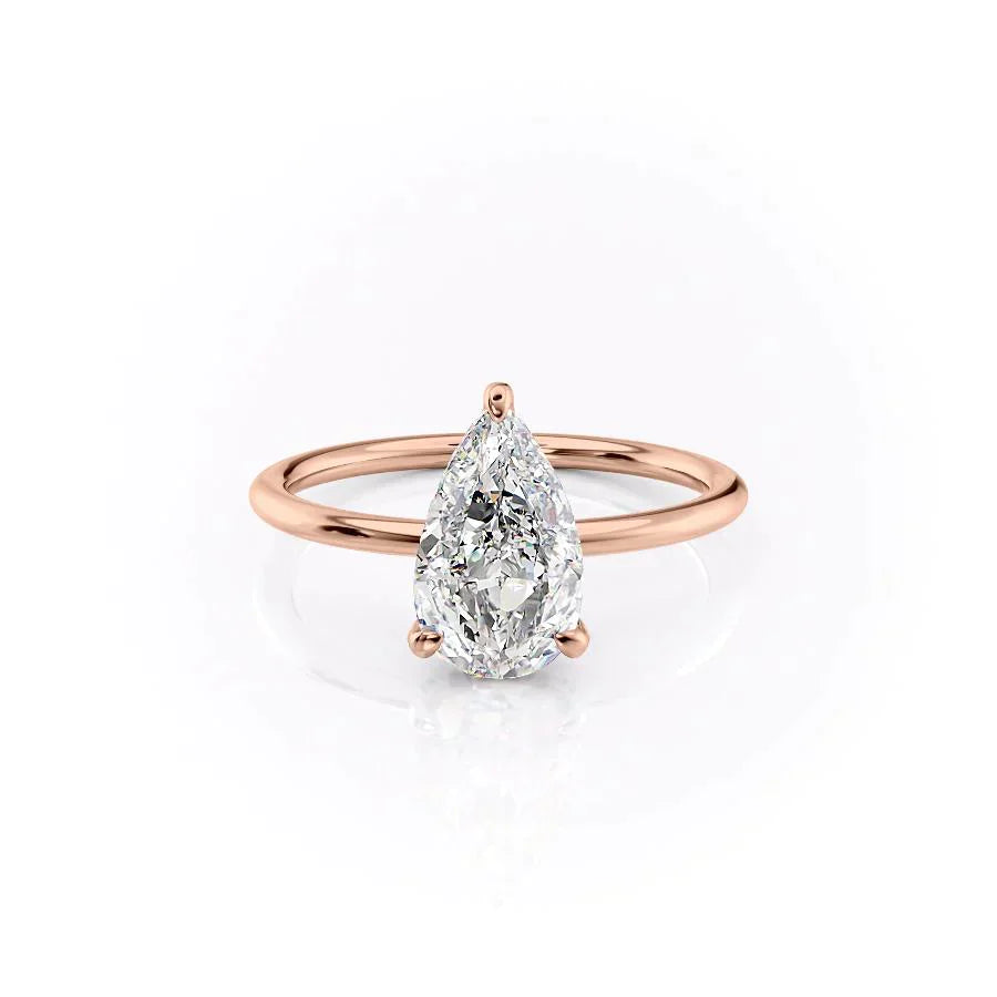 The Crown Kamellie Set With A 2 Carat Pear Moissanite