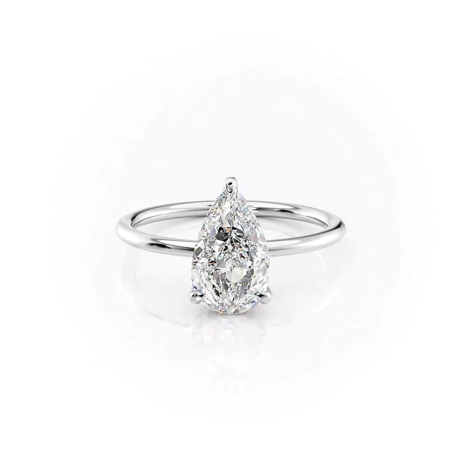 The Crown Kamellie Set With A 2 Carat Pear Moissanite