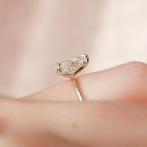 The Crown Kamellie Set With A 1.5 Carat Pear Lab Diamond