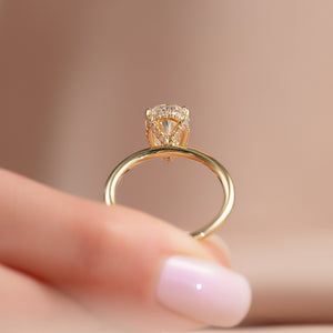 The Crown Kamellie Set With A 1.5 Carat Pear Lab Diamond