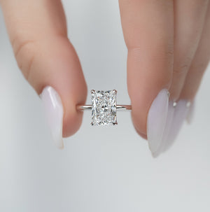 The Crown Kamellie Set With A 1.5 Carat Radiant Lab Diamond