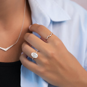 The Pave Crown Kamellie Set With A 4 Carat Oval Moissanite