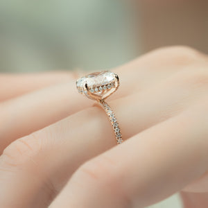The Pave Crown Kamellie Set With A 4 Carat Oval Moissanite