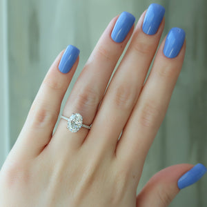 The Pave Crown Kamellie Set With A Oval Lab Diamond