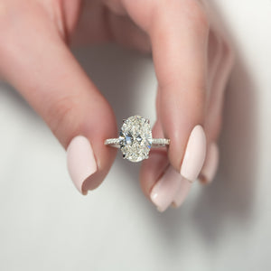 The Pave Crown Kamellie Set With A Oval Lab Diamond
