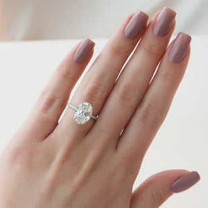 The Pave Crown Kamellie Set With A Oval Lab Diamond