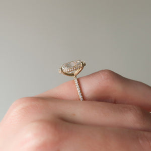 The Pave Crown Kamellie Set With A 1.5 Carat Oval Lab Diamond