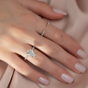 The Pave Crown Kamellie Set With A Pear Lab Diamond
