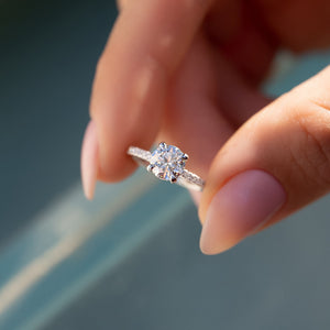 The Pave Crown Kamellie Set With A 1 Carat Round Moissanite