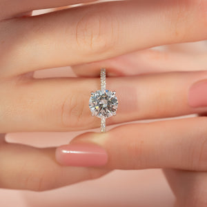 The Pave Crown Kamellie Set With A 1 Carat Round Moissanite