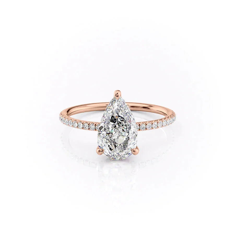 The Pave Crown Kamellie Set With A 1.5 Carat Pear Lab Diamond
