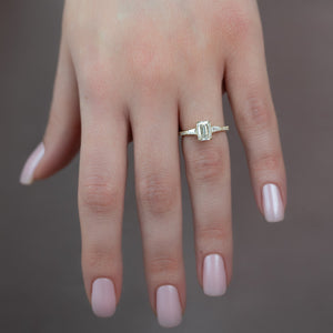 The Pave Liv Set With A Emerald Lab Diamond