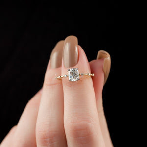 The Hidden Halo Penelope Set With A 2 Carat Elongated Cushion Moissanite