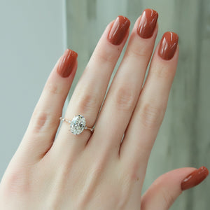 The Hidden Halo Penelope Set With A 1.5 Carat Oval Lab Diamond