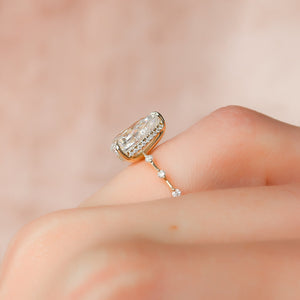 The Hidden Halo Penelope Set With A 5 Carat Pear Moissanite