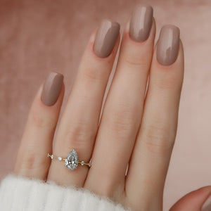 The Hidden Halo Penelope Set With A 5 Carat Pear Moissanite