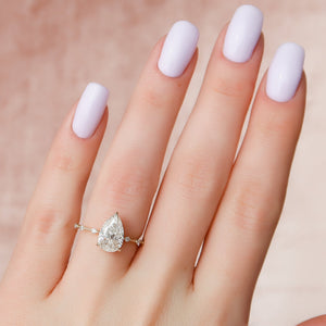 The Hidden Halo Penelope Set With A 5 Carat Pear Moissanite