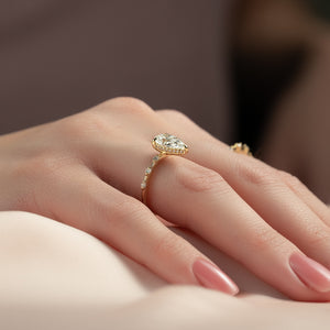 The Hidden Halo Penelope Set With A 5 Carat Pear Moissanite
